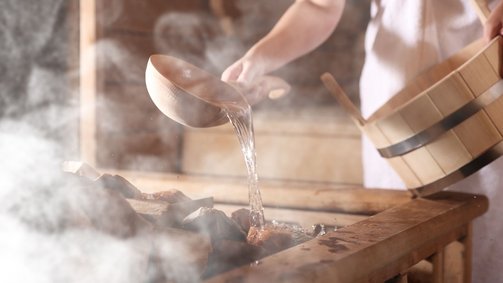 Steam rising from sauna stones